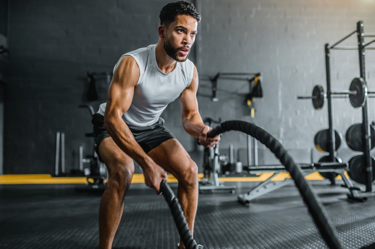 Man training with battle ropes